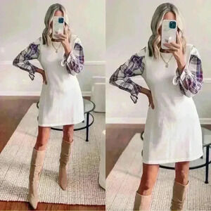 White dress with plaid sleeves